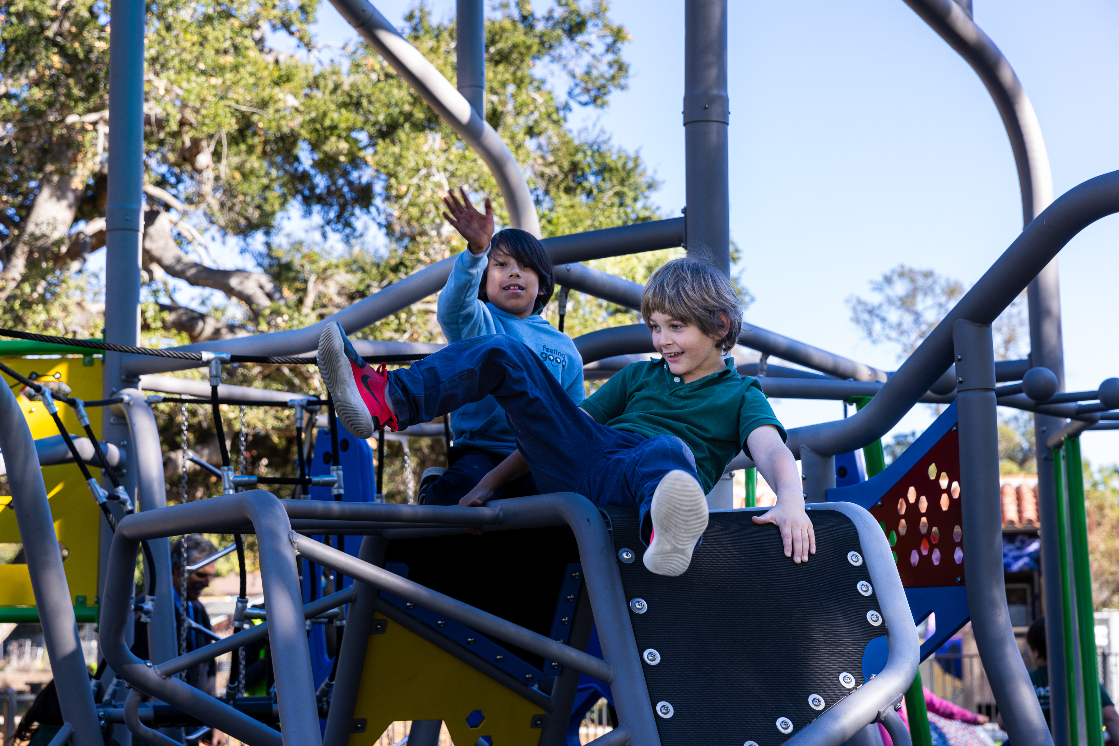 Children play on the new playground at Eastside Neighborhood Park