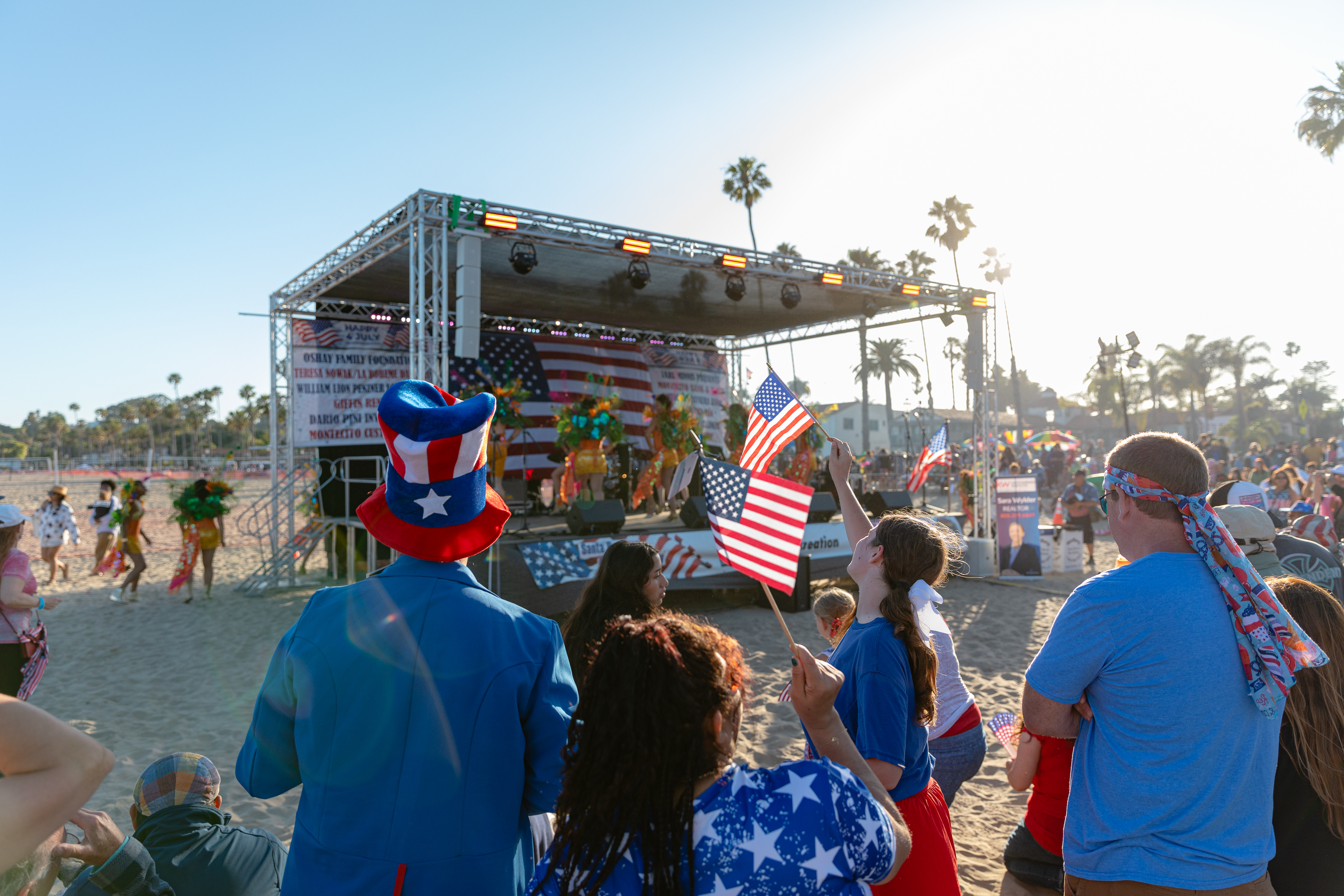 Community members celebrate Independence Day at the West Beach bandstand
