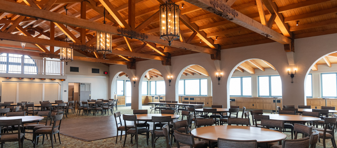 Cabrillo Pavilion Event Center set up with circle tables surrounding a central dancefloor