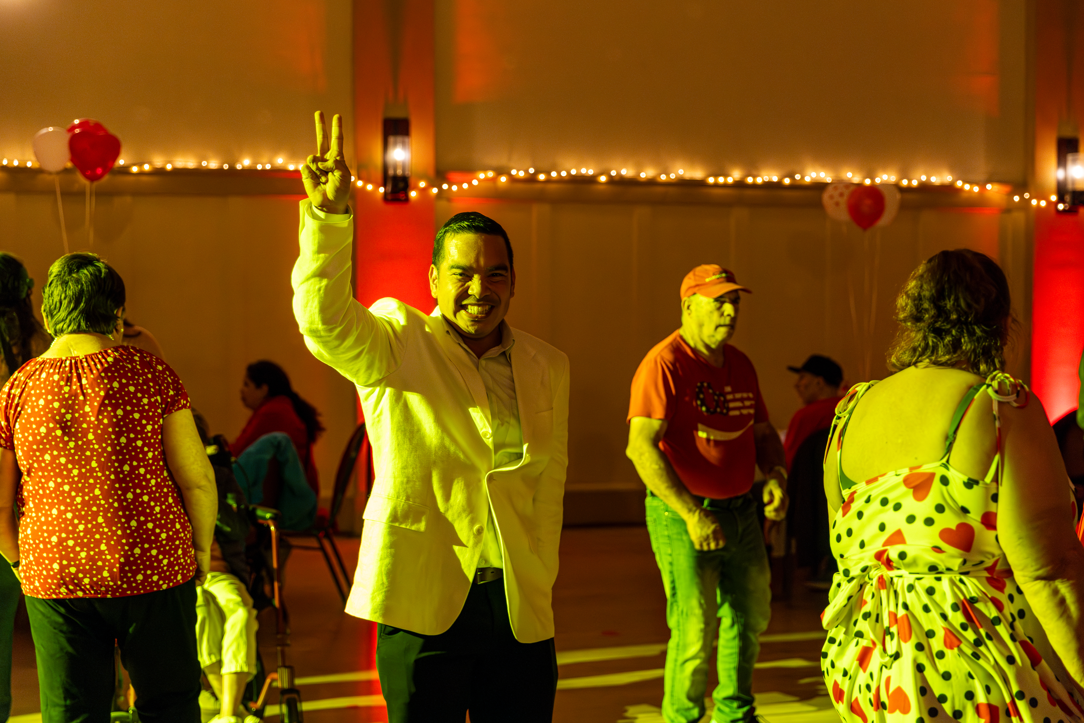 Adapted Recreation Program participant dances at the Valentine's Dance