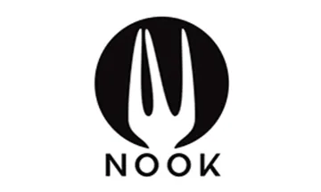 The Nook logo with a white fork with bent tine on a black circle