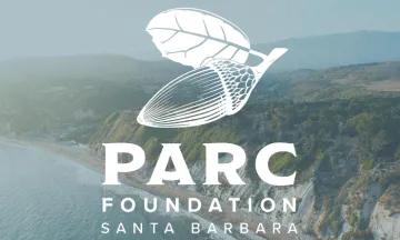 Parc Foundation Logo in white with Douglas Family Preserve as background