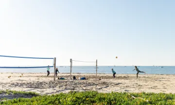East Beach volleyball court in use by community members