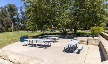Picnic site at La Mesa Park with playground in background