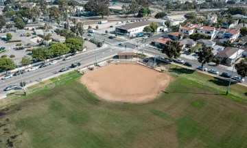 Aerial view of Cabrillo Ball Park softball field with city street in the background