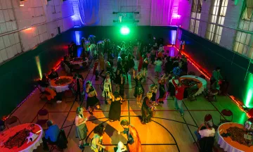 overhead view of the Adapted Program Halloween Dance with participants dancing