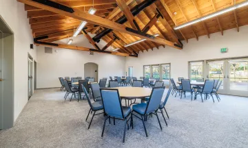 Casa Las Palmas interior with tables and chairs set up