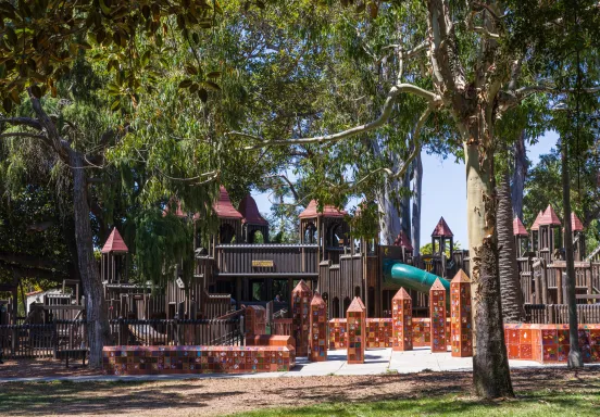 Kids World playground surrounded by trees