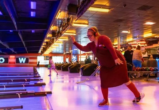 Adapted Recreation participant bowls at Bowlero