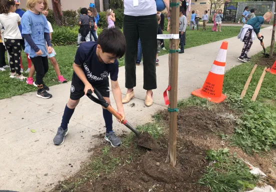Students help plant new trees for Arbor Day