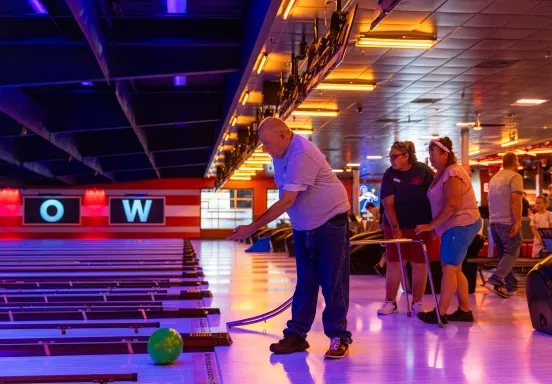 Program participant bowls at the Adapted Recreation Program