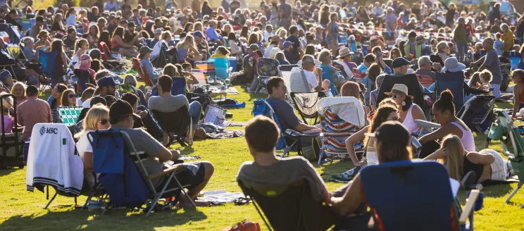 Attendees of Concerts in the Park enjoying live music