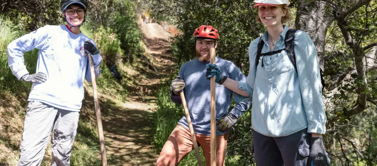 Trail volunteers posing and smiling