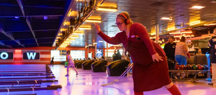 Adapted Recreation participant bowls at Bowlero
