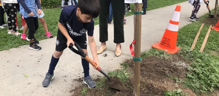 Students help plant new trees for Arbor Day