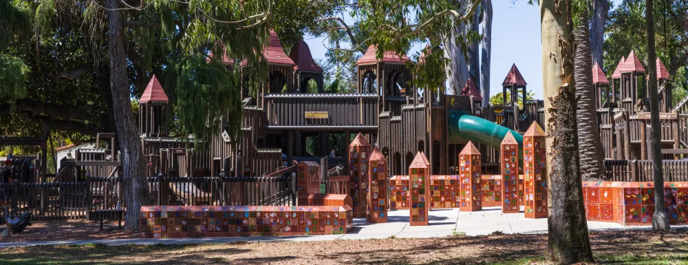 Kids World playground surrounded by trees