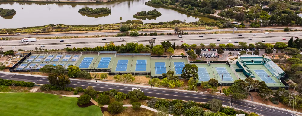 An aerial view of tennis and pickleball courts