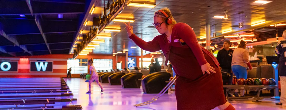 Adapted Recreation participant bowls at Bowlero