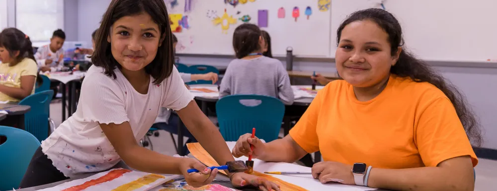 Campers in the Summer Fun Program work on their painting craft