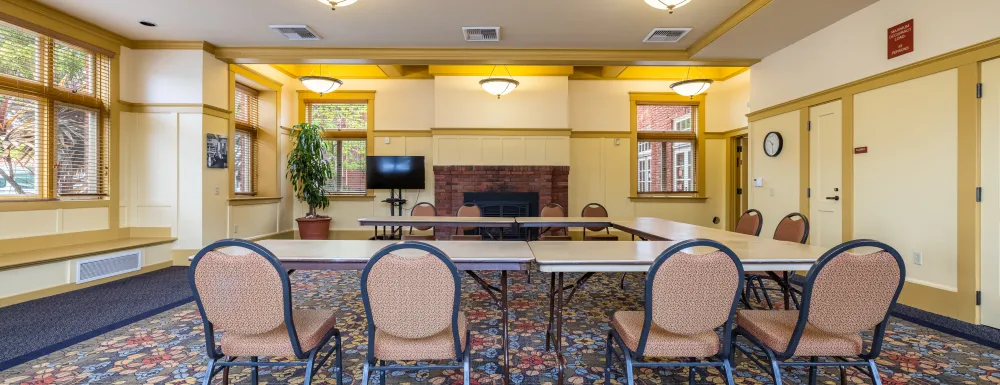 Carrillo Recreation Center Meeting Room with table and chairs set up in the center