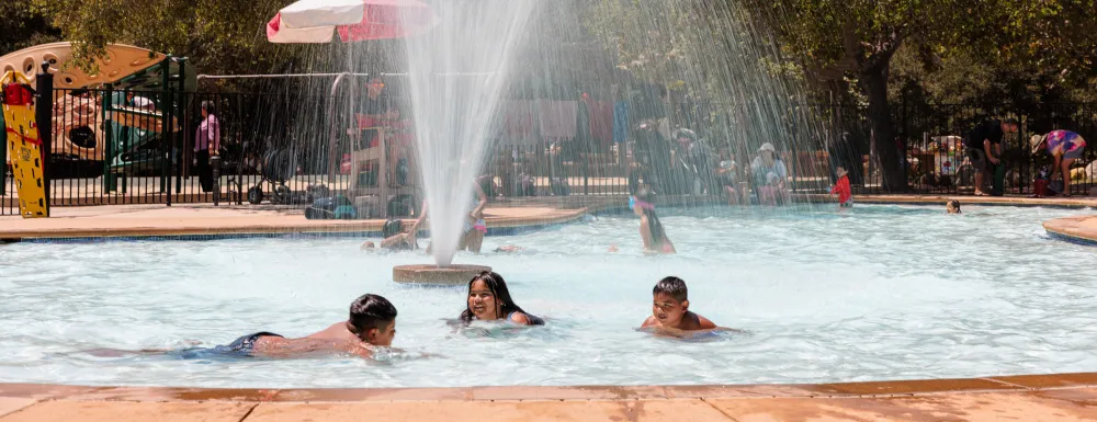 Children play in Oak Park Wading Pool