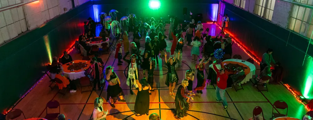 overhead view of the Adapted Program Halloween Dance with participants dancing
