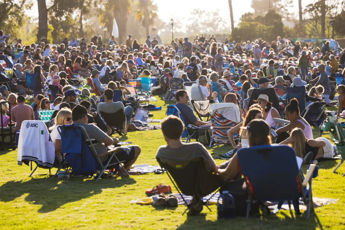 Attendees of Concerts in the Park enjoying live music