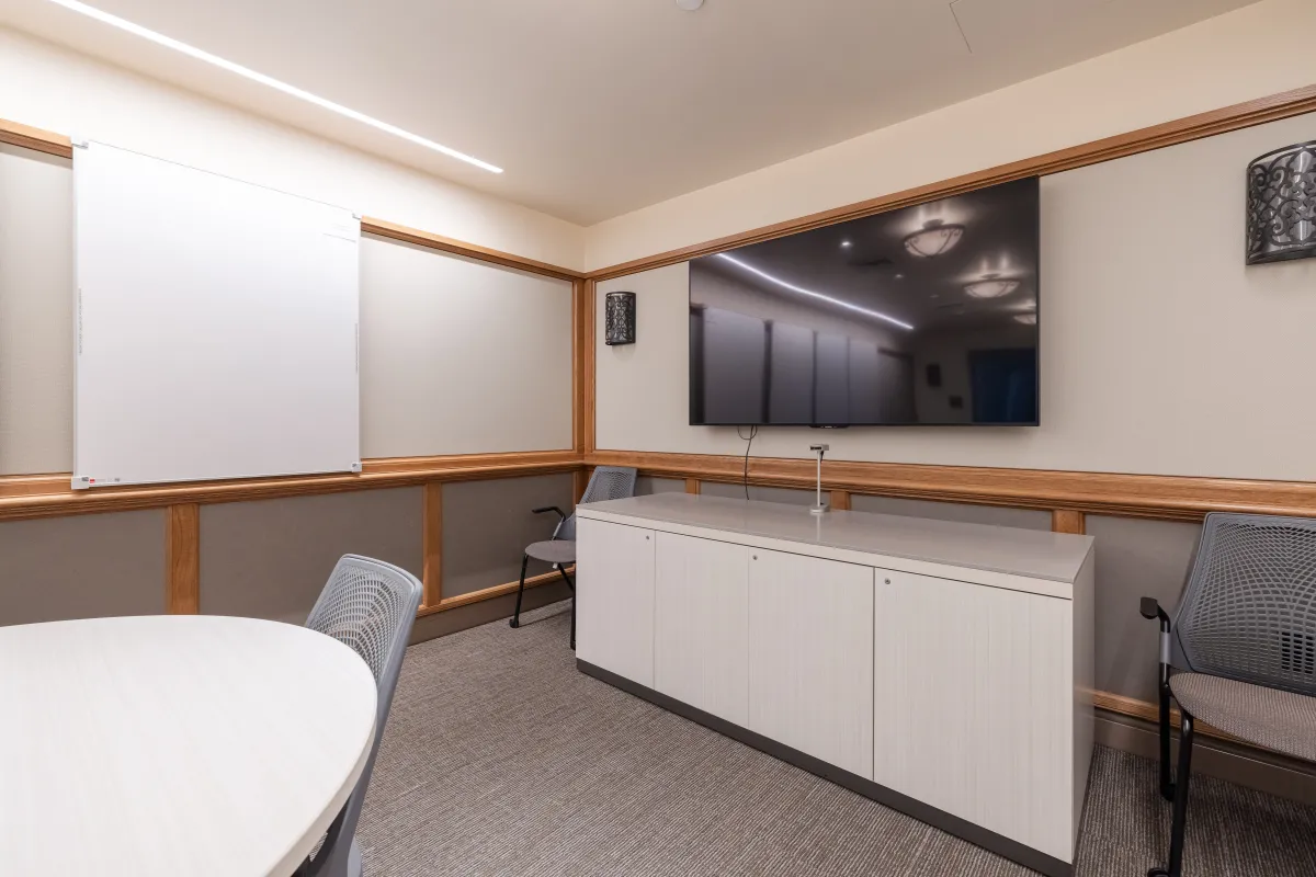 Cabrillo Pavilion conference room featuring a television on the end wall and white boards on the side walls