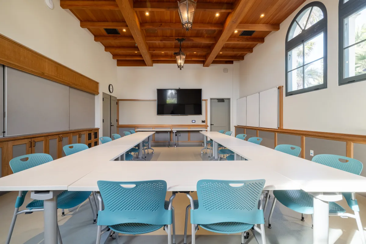 Training Room at the Cabrillo Pavilion with tables and chairs, whiteboards, and a presentation TV