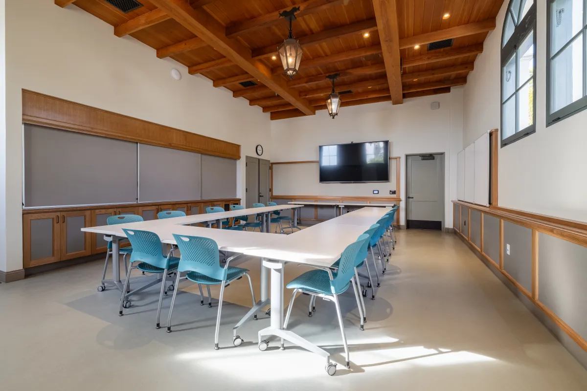 Training Room at the Cabrillo Pavilion with tables and chairs, whiteboards, and a presentation TV