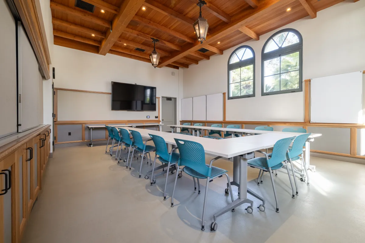 Training Room at the Cabrillo Pavilion with tables and chairs, whiteboards, and a presentation TV