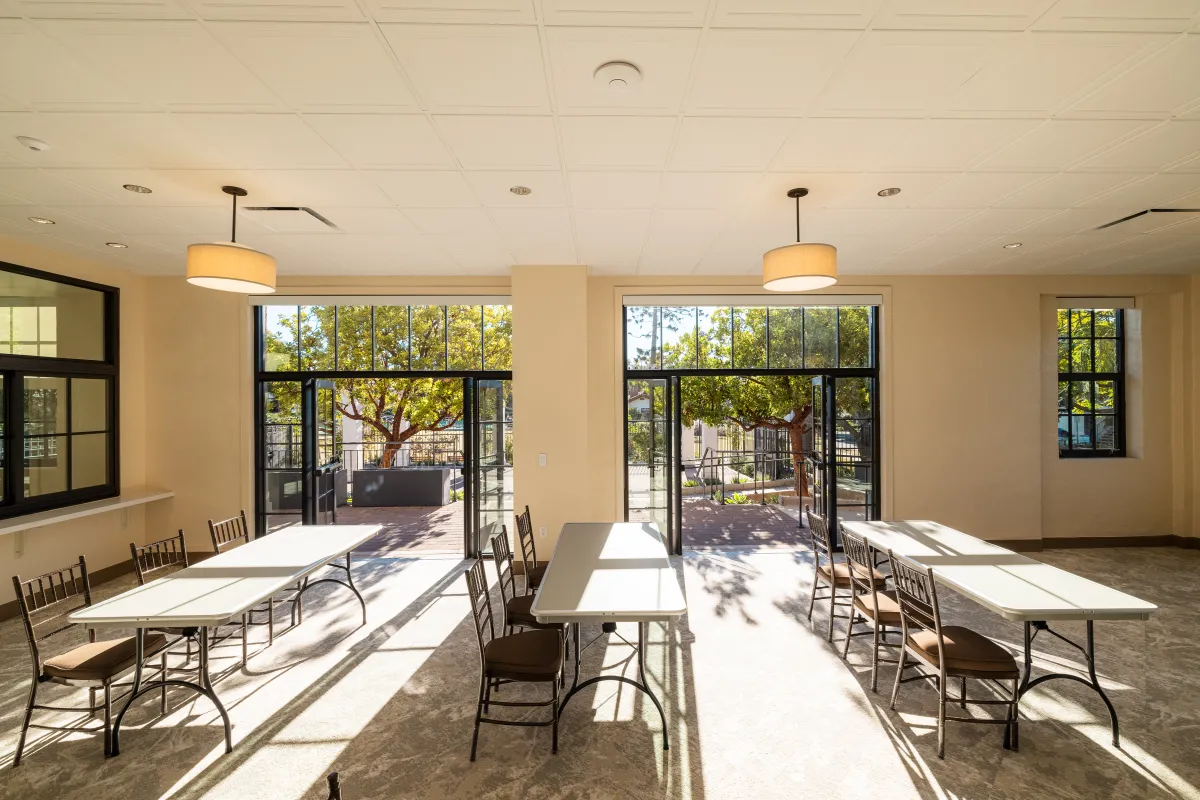 Louise Lowry Davis Center Activity Loung with doors open to patio