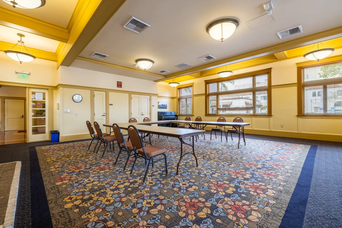 Carrillo Recreation Center Meeting Room with table and chairs set up in the center