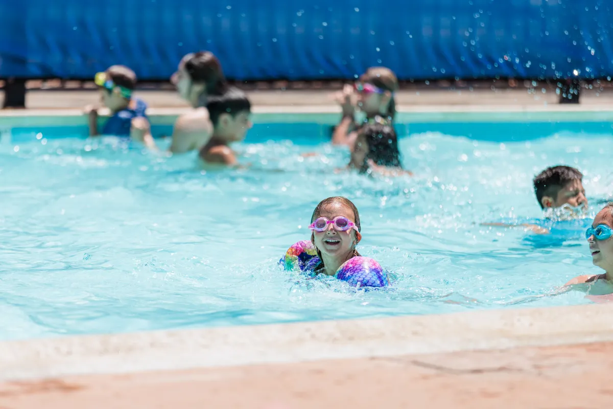 Kids swim in Ortega Park Pool