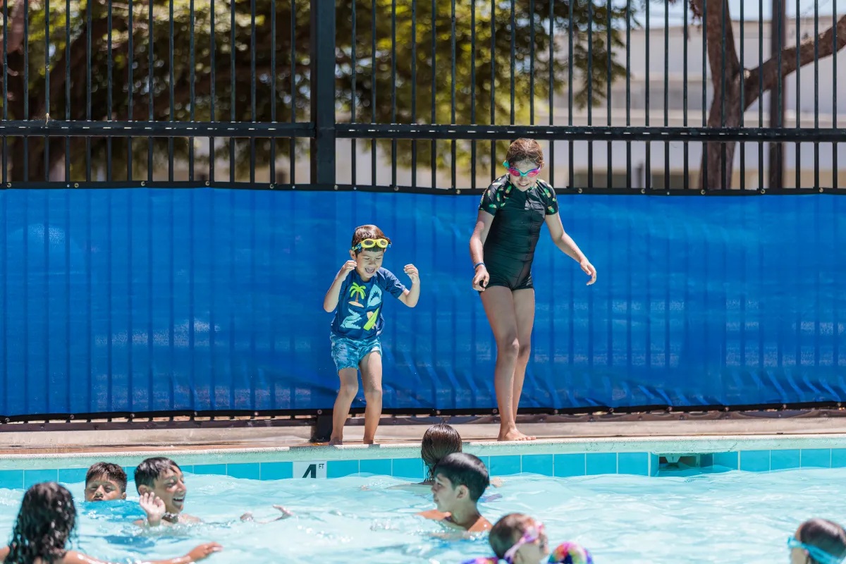 Kids play in Ortega Park Pool