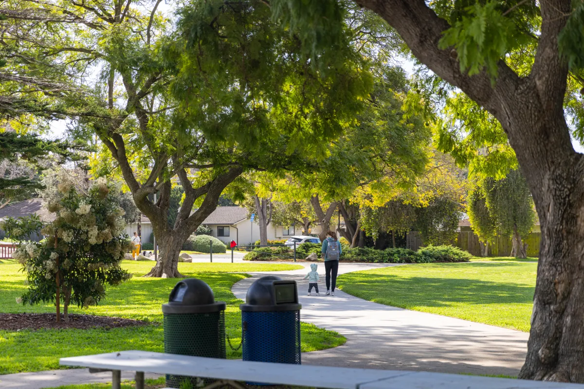 Mother and son walking in Willowglen Park