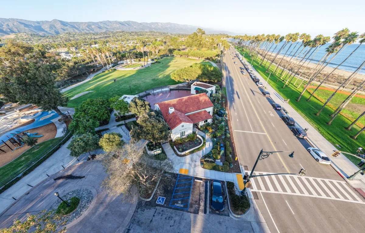 Aerial view of Casa Las Palmas showcasing its close proximity to the beach and the Chase Palm Park Great Meadow