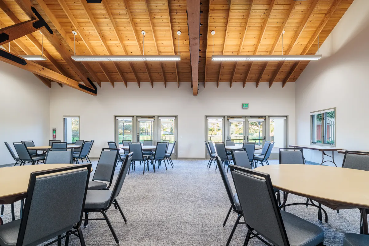Casa Las Palmas interior with tables and chairs set up