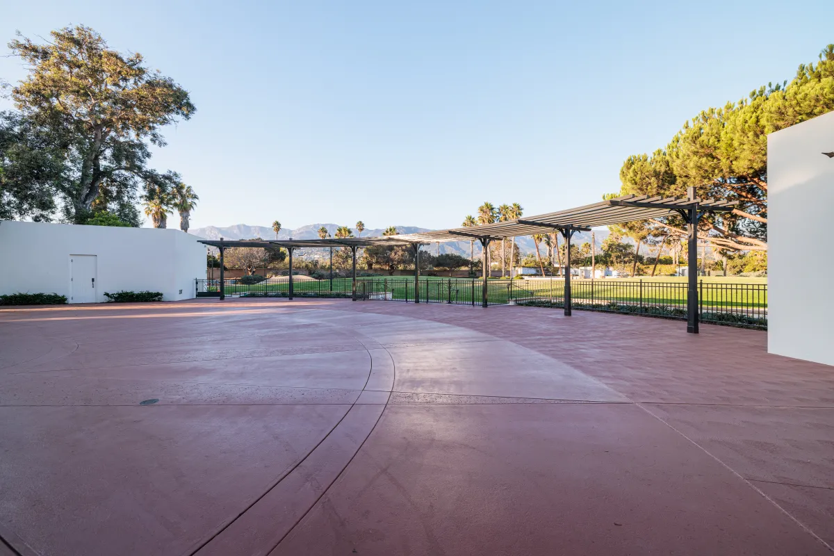 Casa Las Palmas patio with view of the Chase Palm Park Great Meadow