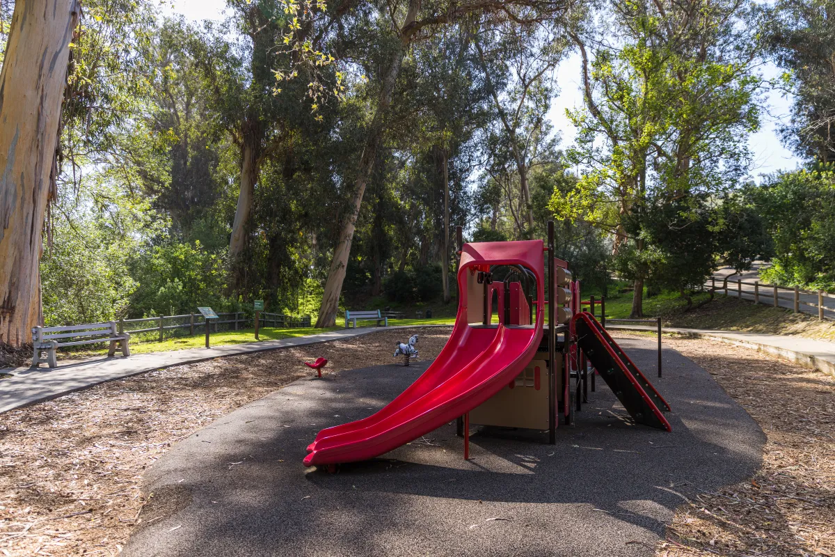 Playground with red slide in Hidden Valley Park