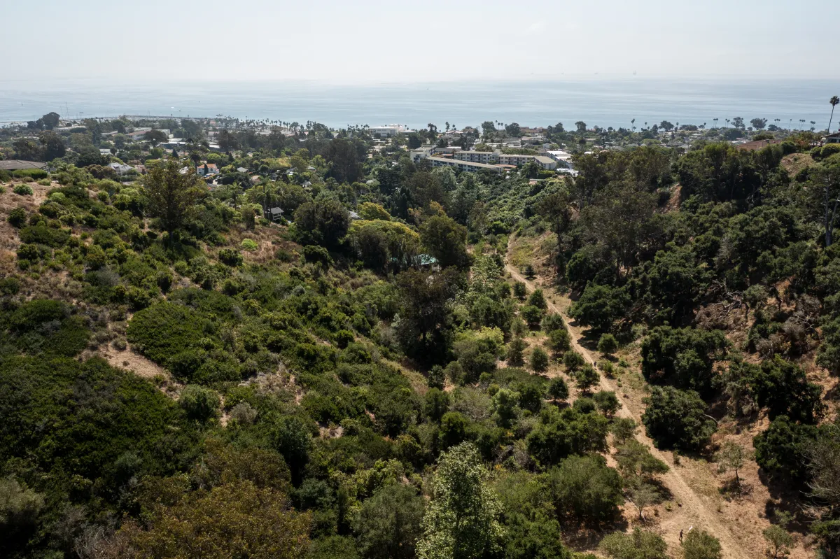 aerial view of Honda Valley Park trails with ocean view in the background