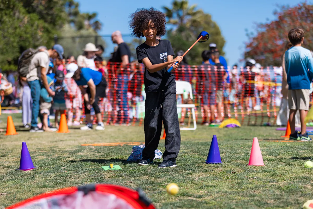 Child playing snag golf