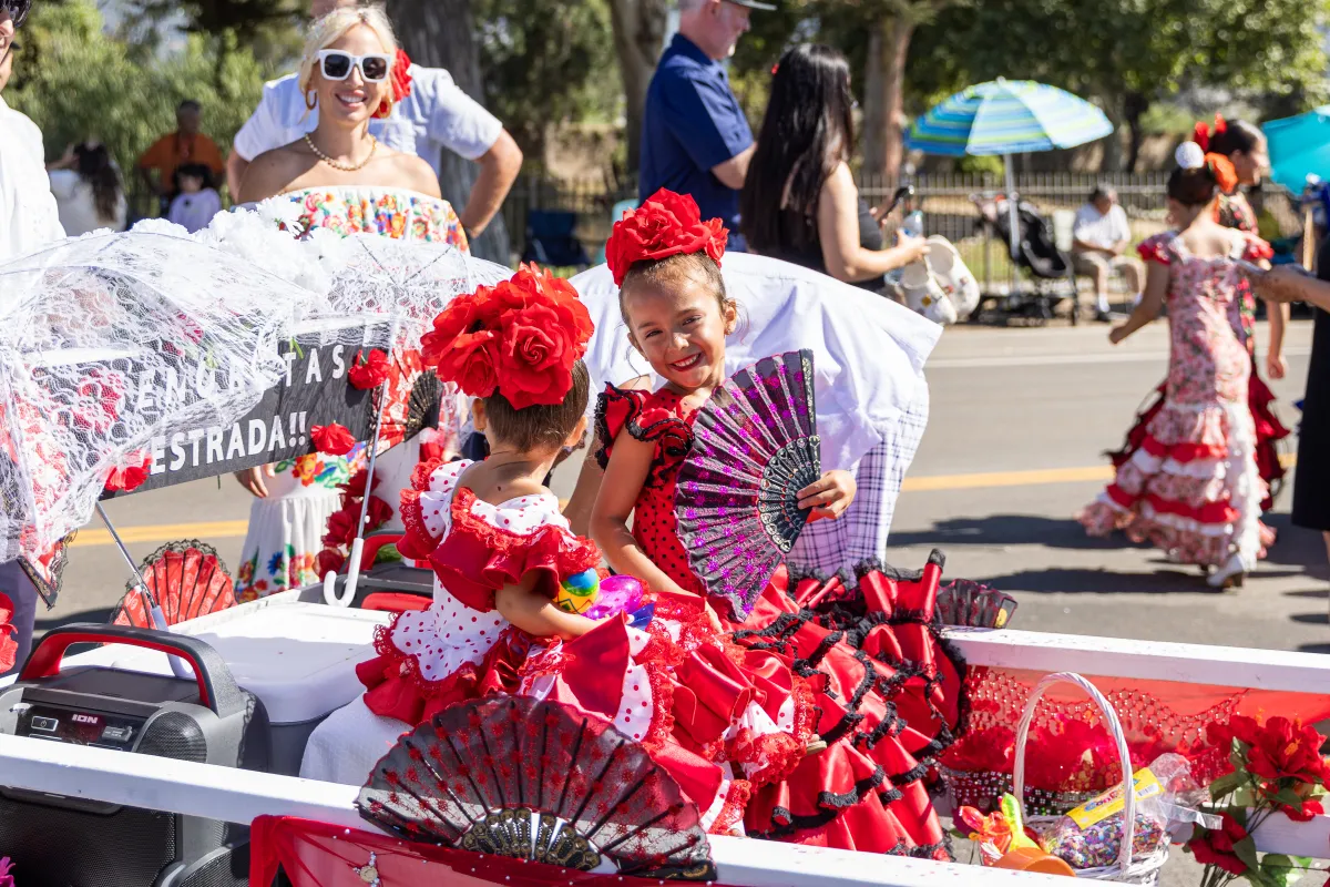 Photo from Children's Fiesta Parade, Flamenco Dancers in Red and White Dresses