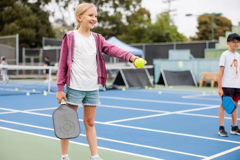Camper serves in Pickleball Camp