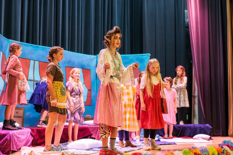 Campers perform on stage at the Carrillo Ballroom during Theater Camp