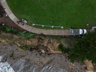 Overhead view of bluff erosion at Shoreline Park with temporary fencing in place